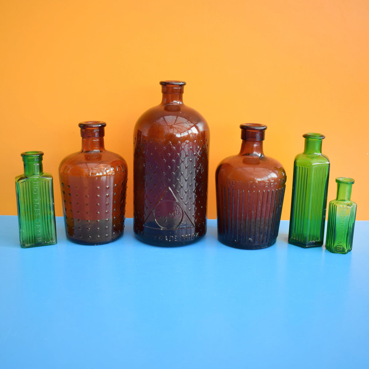 Vintage 1920s Glass Poison Bottles - Emerald Green / Amber - Halloween Prop by Vintage