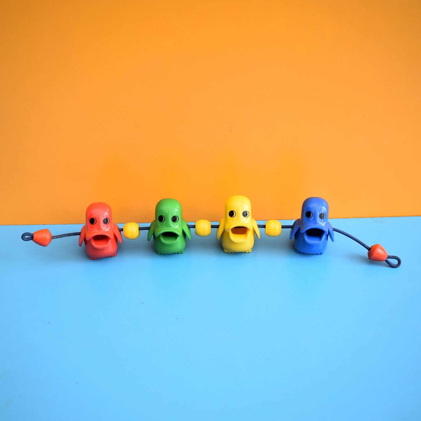 Vintage 1980s Plastic Pram Toys - Bright Colours