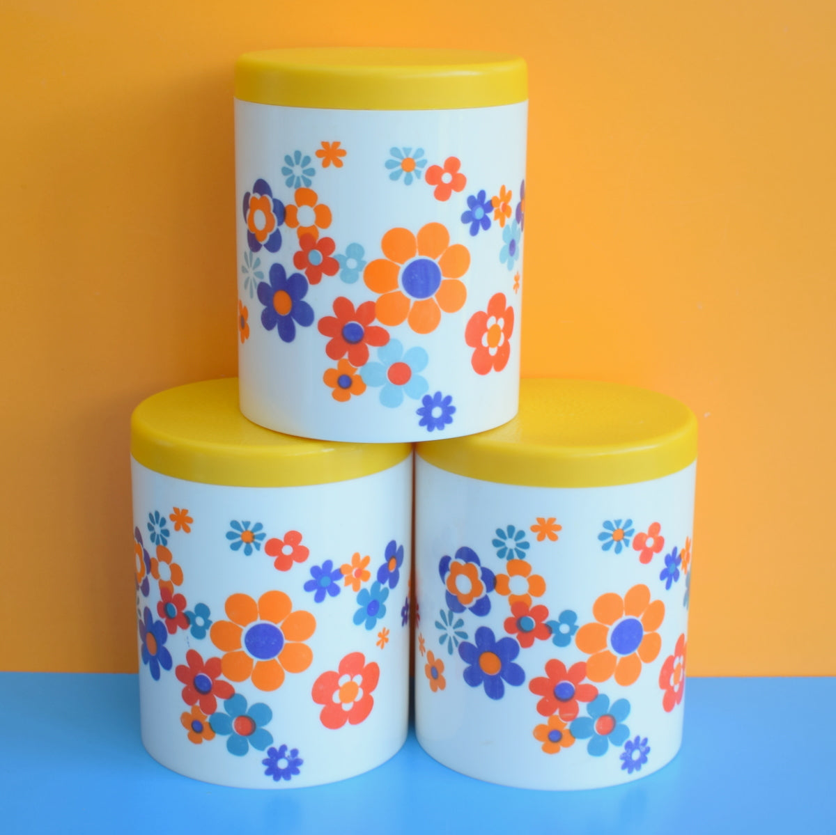 Vintage 1970s Flower Power Plastic Canister - Orange, Yellow & Blue