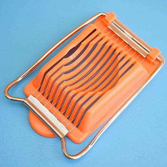 Vintage 1970s Plastic Egg Slicer - Orange .