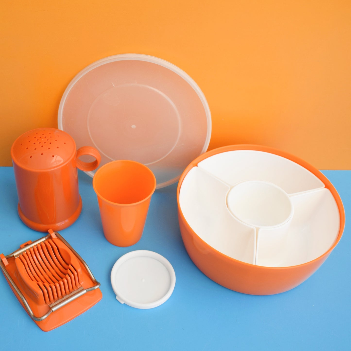Vintage 1970s Plastic Egg Slicer / Flour Shaker / Storage - Orange - England by Vintage