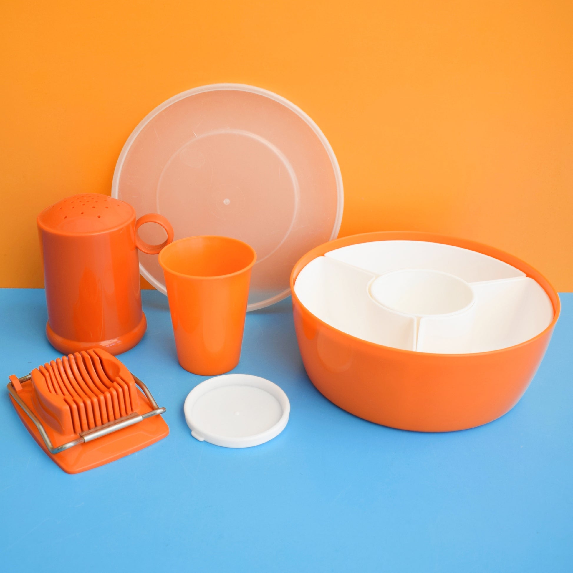 Vintage 1970s Plastic Egg Slicer / Flour Shaker / Storage - Orange - England by Vintage