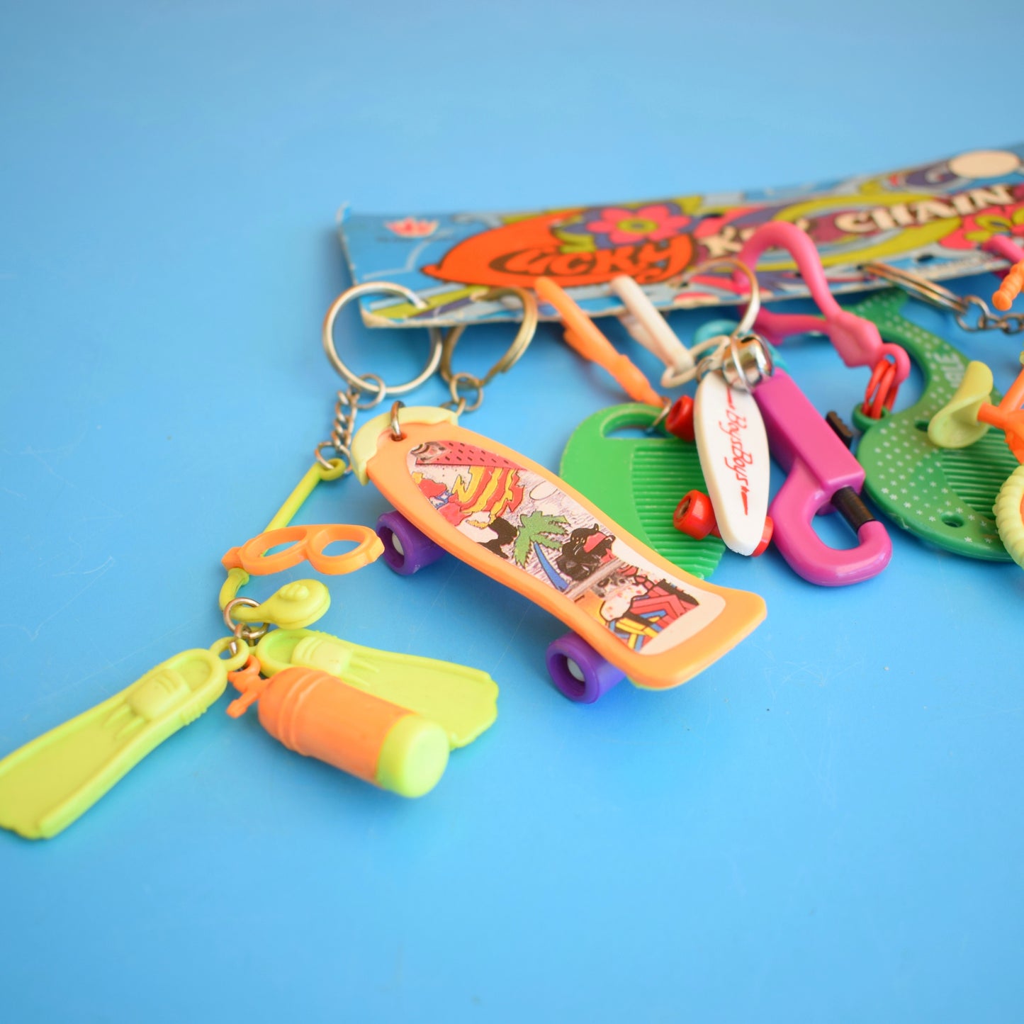 Vintage 1980s Mixed Keyring Collection - BMX / Skateboard On Card by Pineapple Retro