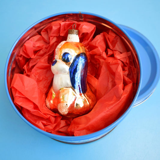 Vintage 1960s Glass Christmas Decoration - Dog In Roses Chocolate Tin by Pineapple Retro