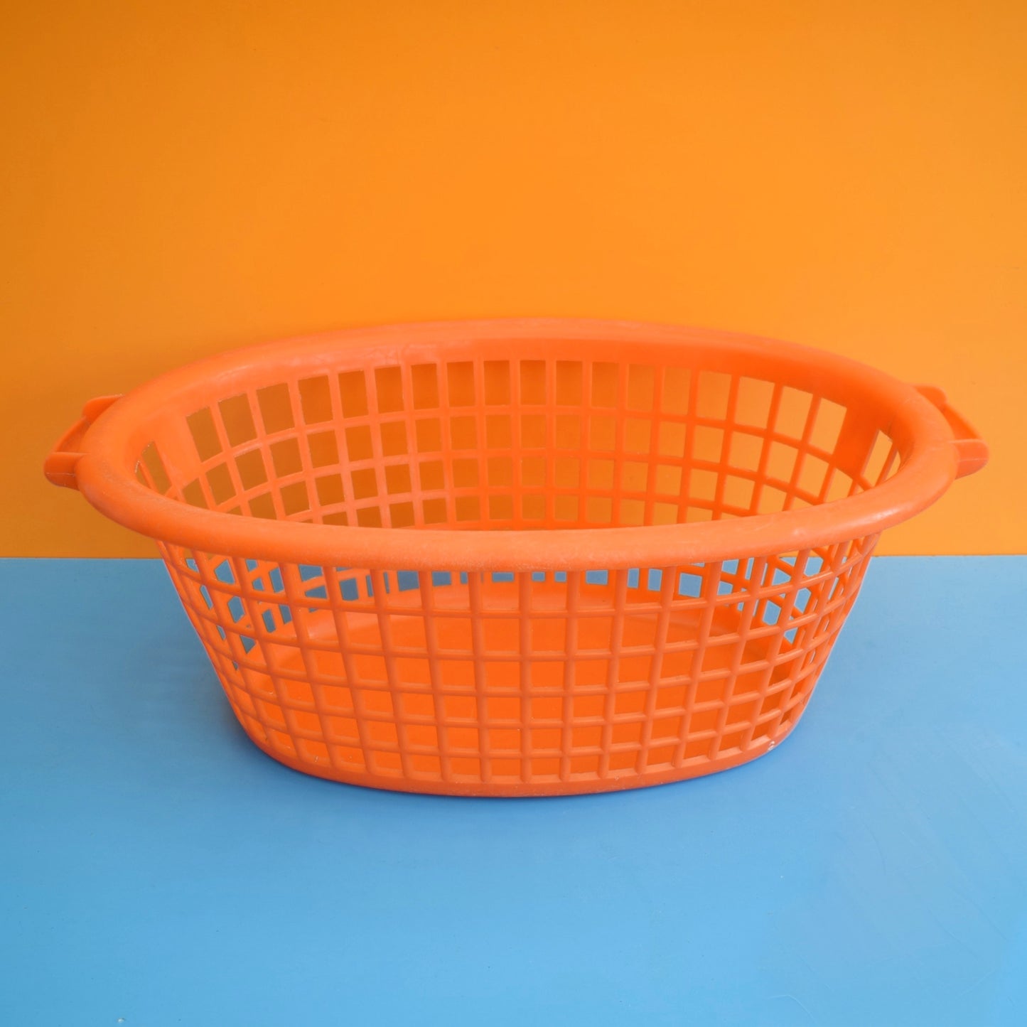 Vintage 1970s Plastic Washing Basket - Orange .