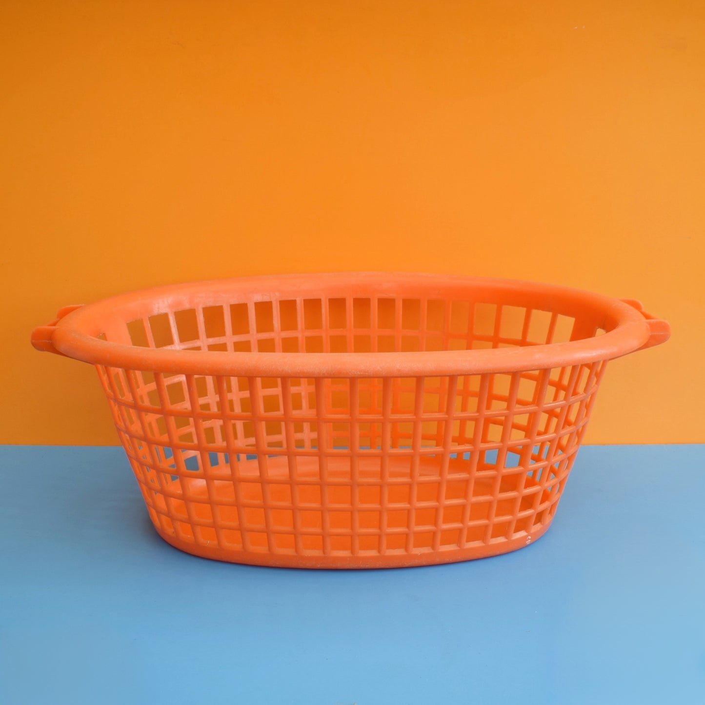 Vintage 1970s Plastic Washing Basket - Orange .