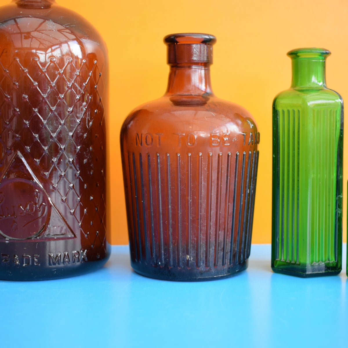 Vintage 1920s Glass Poison Bottles - Emerald Green / Amber - Halloween Prop by Vintage