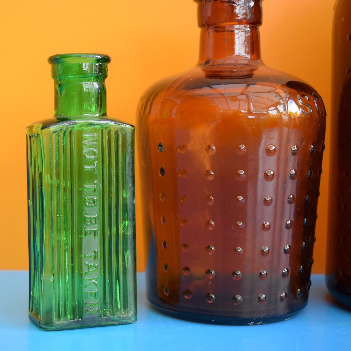 Vintage 1920s Glass Poison Bottles - Emerald Green / Amber - Halloween Prop by Vintage