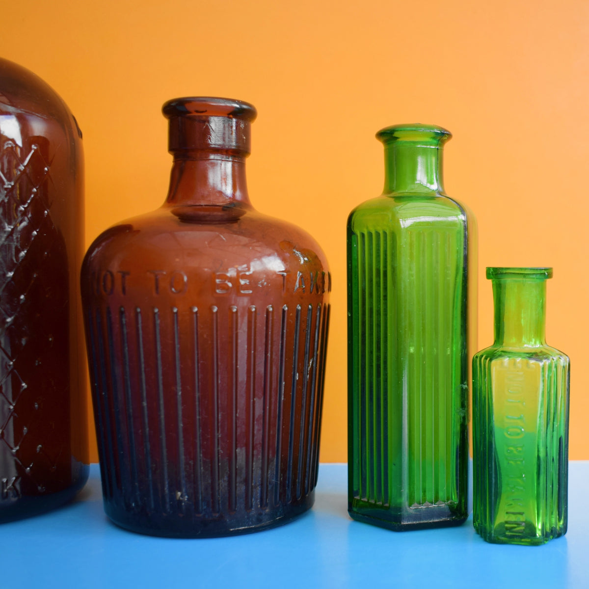 Vintage 1920s Glass Poison Bottles - Emerald Green / Amber - Halloween Prop by Vintage