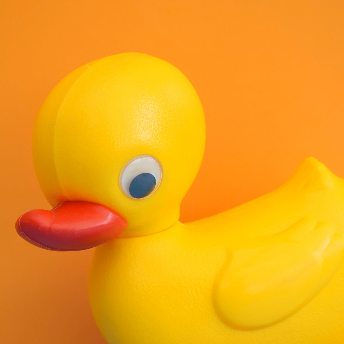 Vintage 1980s Plastic Yellow Duck With Red Wheels