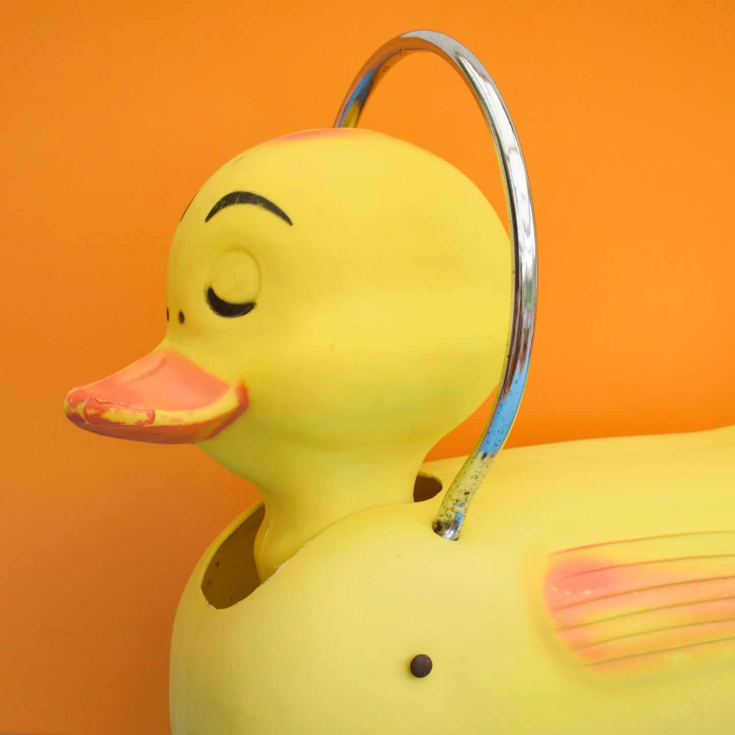 Vintage 1960s Kitsch Plastic Ride On Duck With Wheels - Yellow & Chrome .