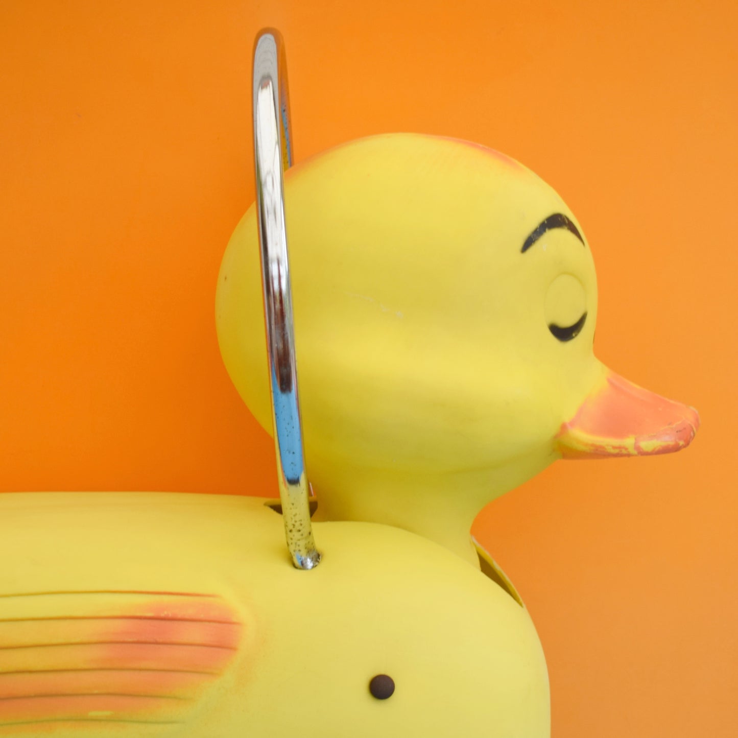 Vintage 1960s Kitsch Plastic Ride On Duck With Wheels - Yellow & Chrome .