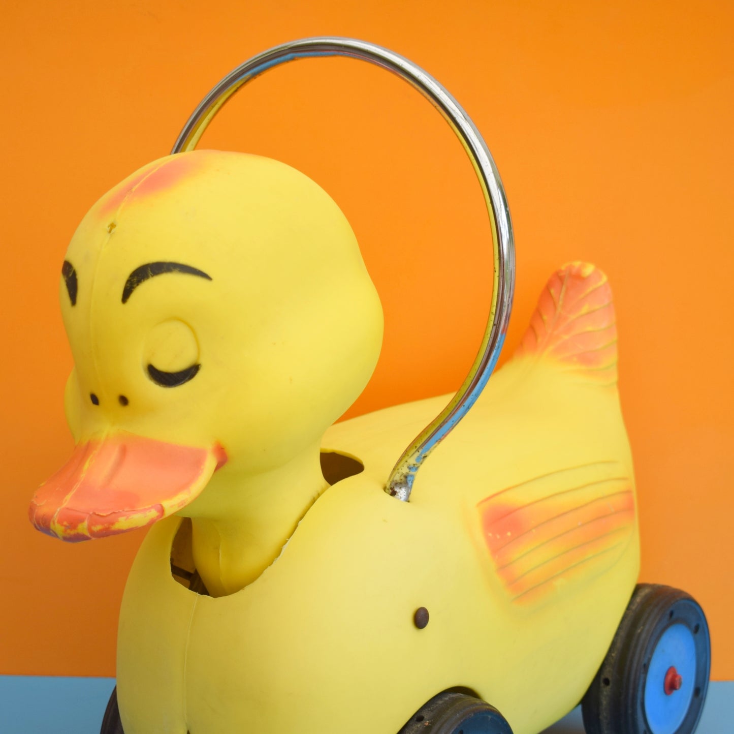 Vintage 1960s Kitsch Plastic Ride On Duck With Wheels - Yellow & Chrome .