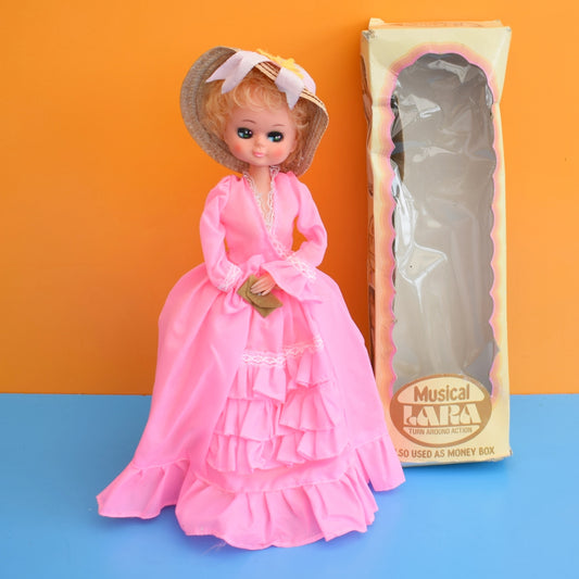 Vintage 1970s Musical Lara Doll Money Box
