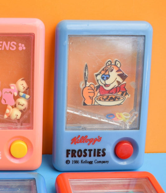 Vintage 1990s Tomy Pocket Water Games by Pineapple Retro