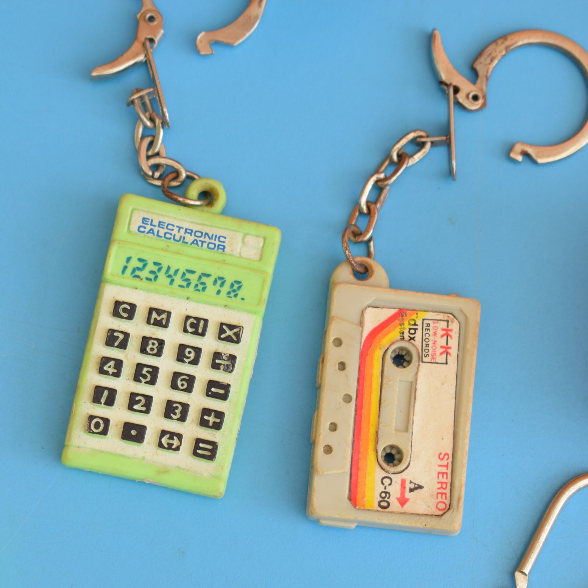 Vintage 1980s Mixed Keyrings - PacMan, Miniatures Etc by Pineapple Retro