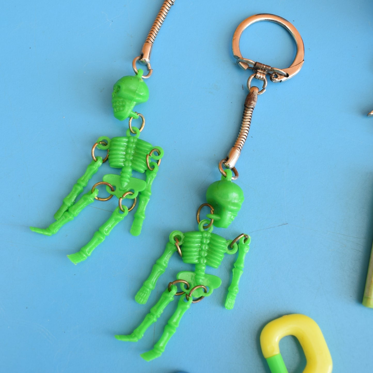 Vintage 1980s Mixed Keyrings - PacMan, Miniatures Etc by Pineapple Retro