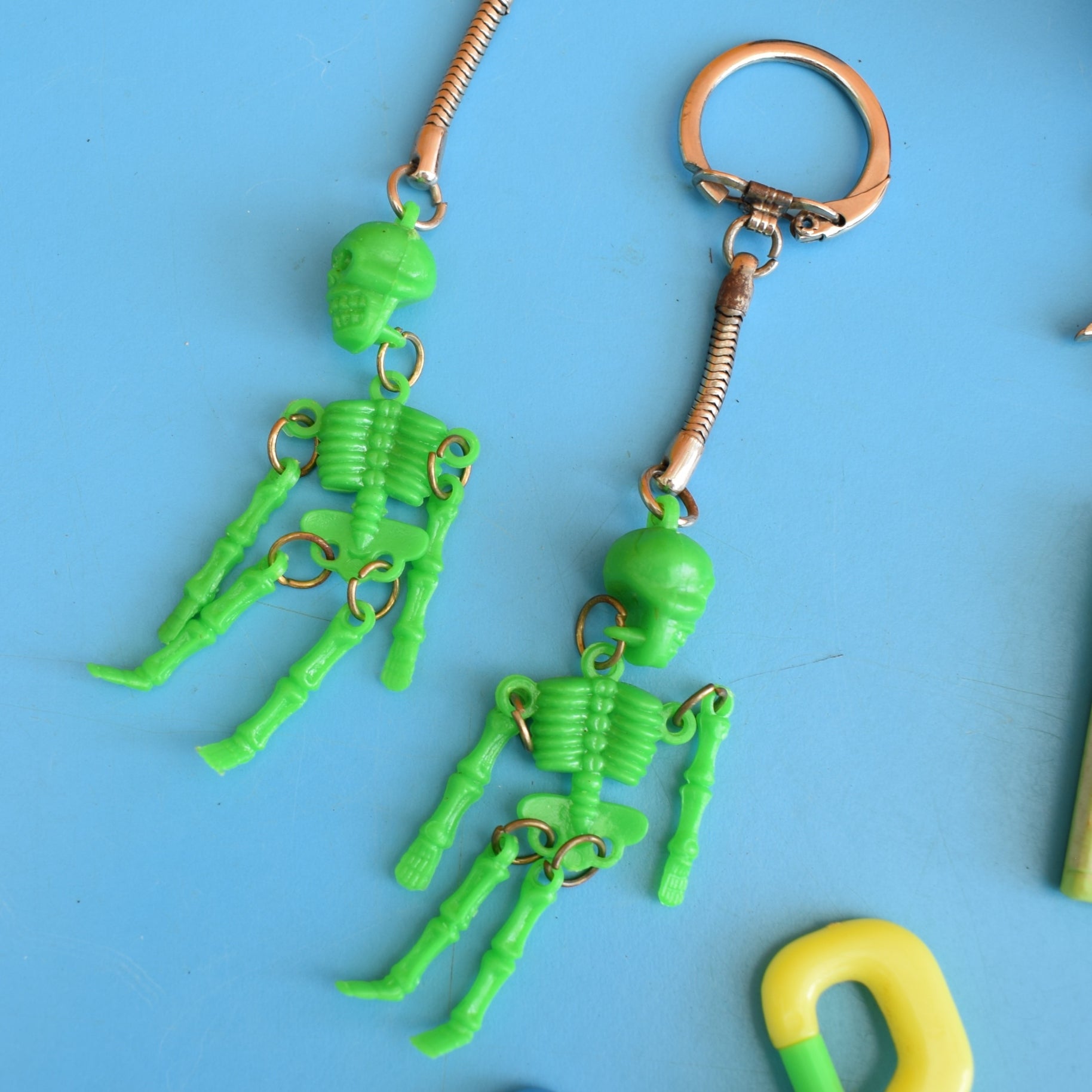 Vintage 1980s Mixed Keyrings - PacMan, Miniatures Etc by Pineapple Retro