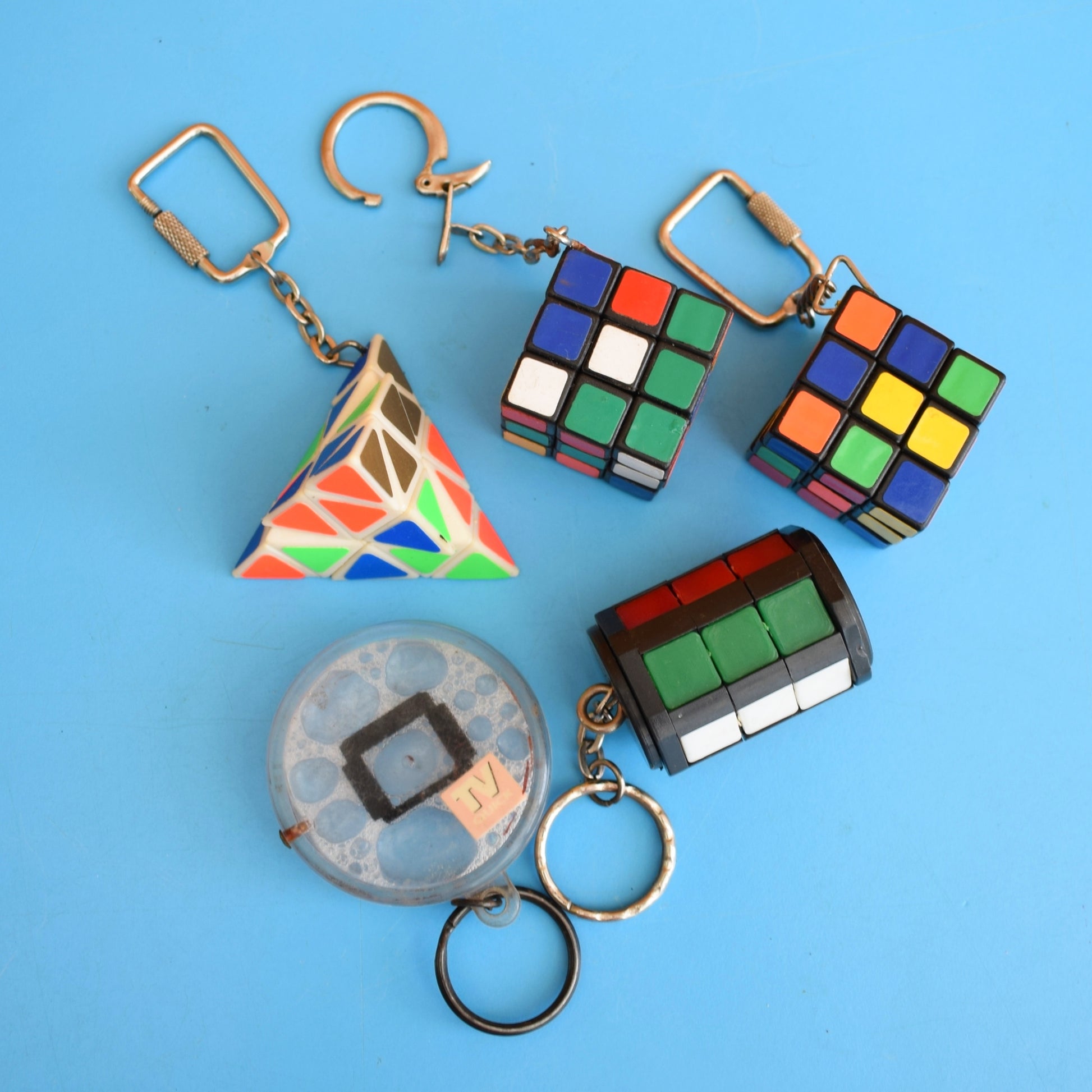 Vintage 1980s Mixed Keyrings - PacMan, Miniatures Etc by Pineapple Retro