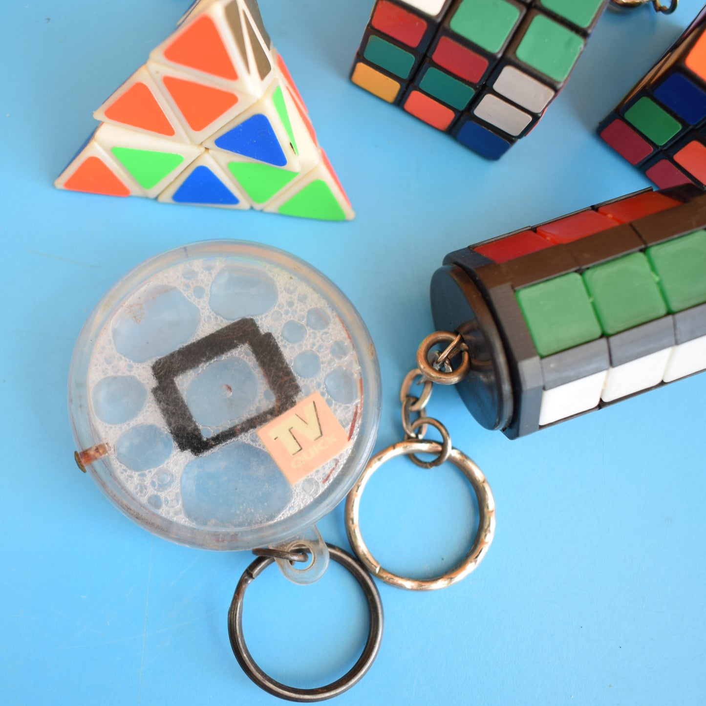 Vintage 1980s Mixed Keyrings - PacMan, Miniatures Etc by Pineapple Retro