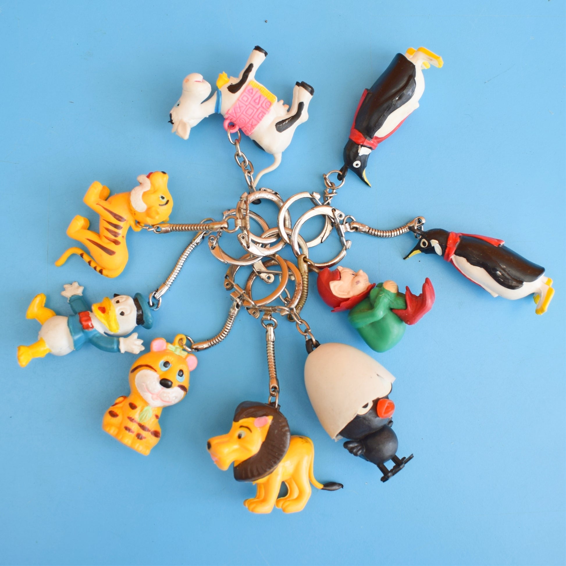 Vintage 1980s Mixed Keyrings - PacMan, Miniatures Etc by Pineapple Retro