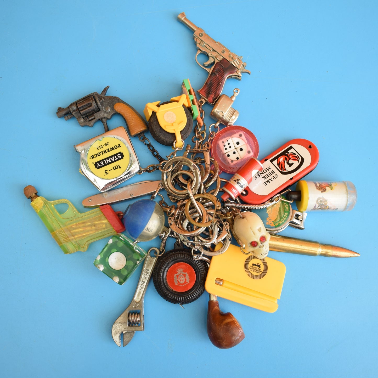 Vintage 1980s Mixed Keyrings - PacMan, Miniatures Etc by Pineapple Retro