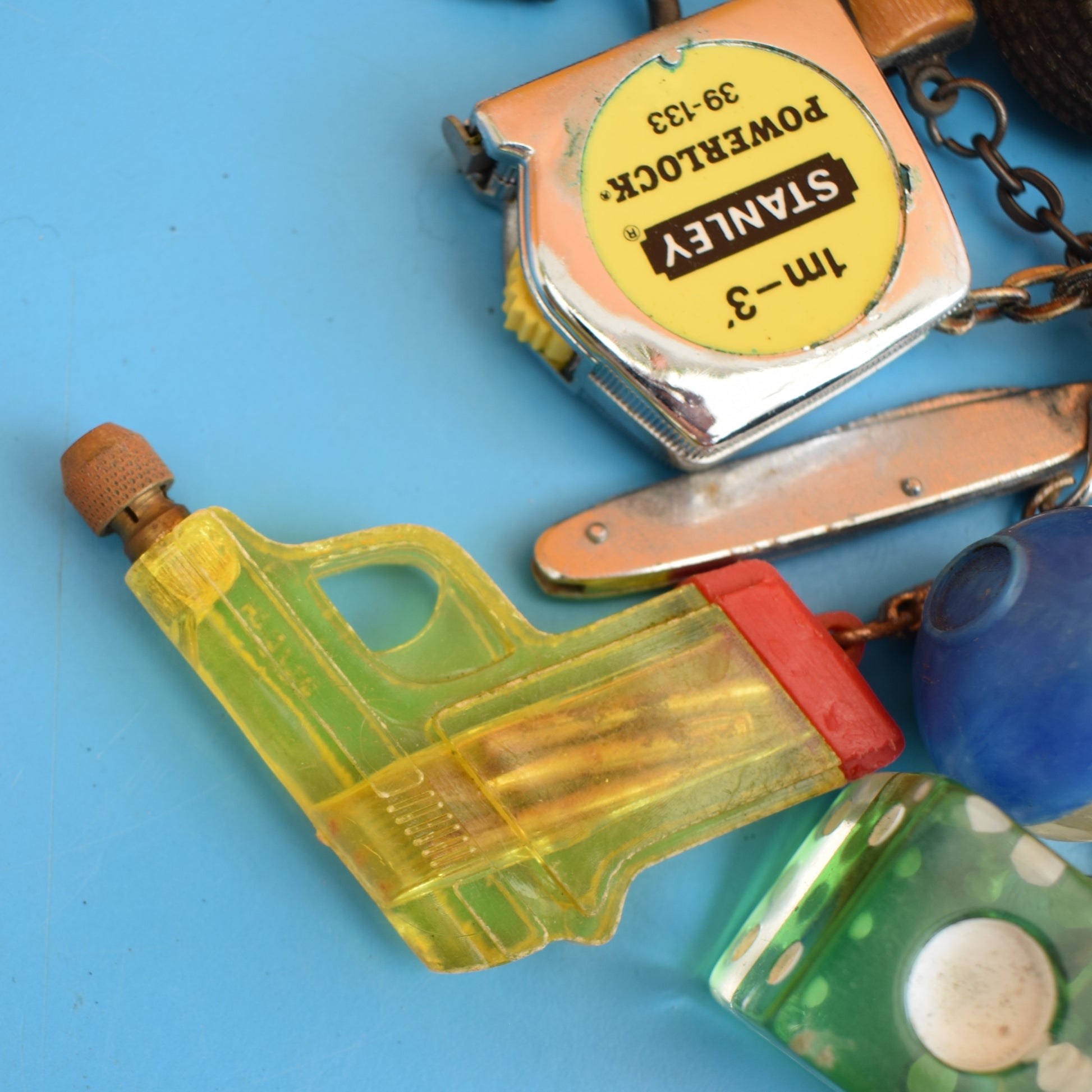 Vintage 1980s Mixed Keyrings - PacMan, Miniatures Etc by Pineapple Retro
