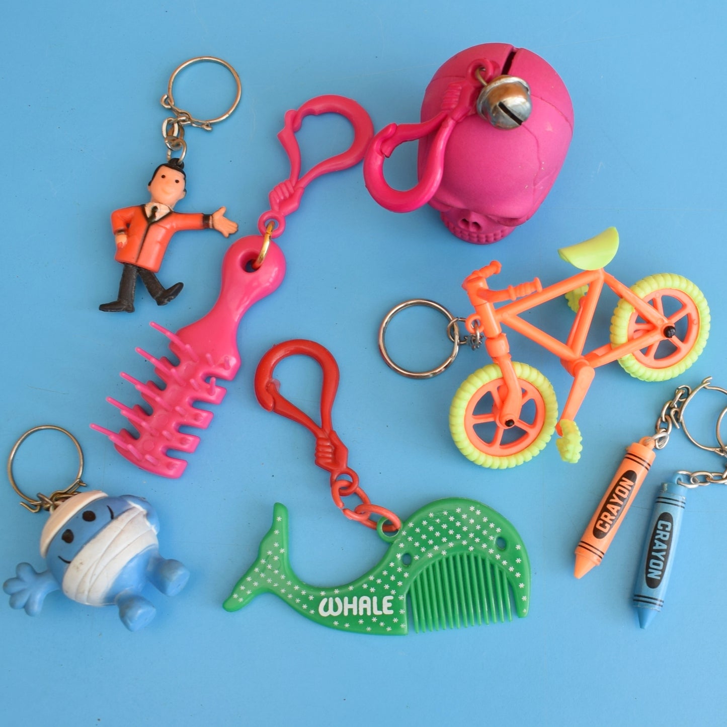 Vintage 1980s Mixed Keyrings - PacMan, Miniatures Etc by Pineapple Retro