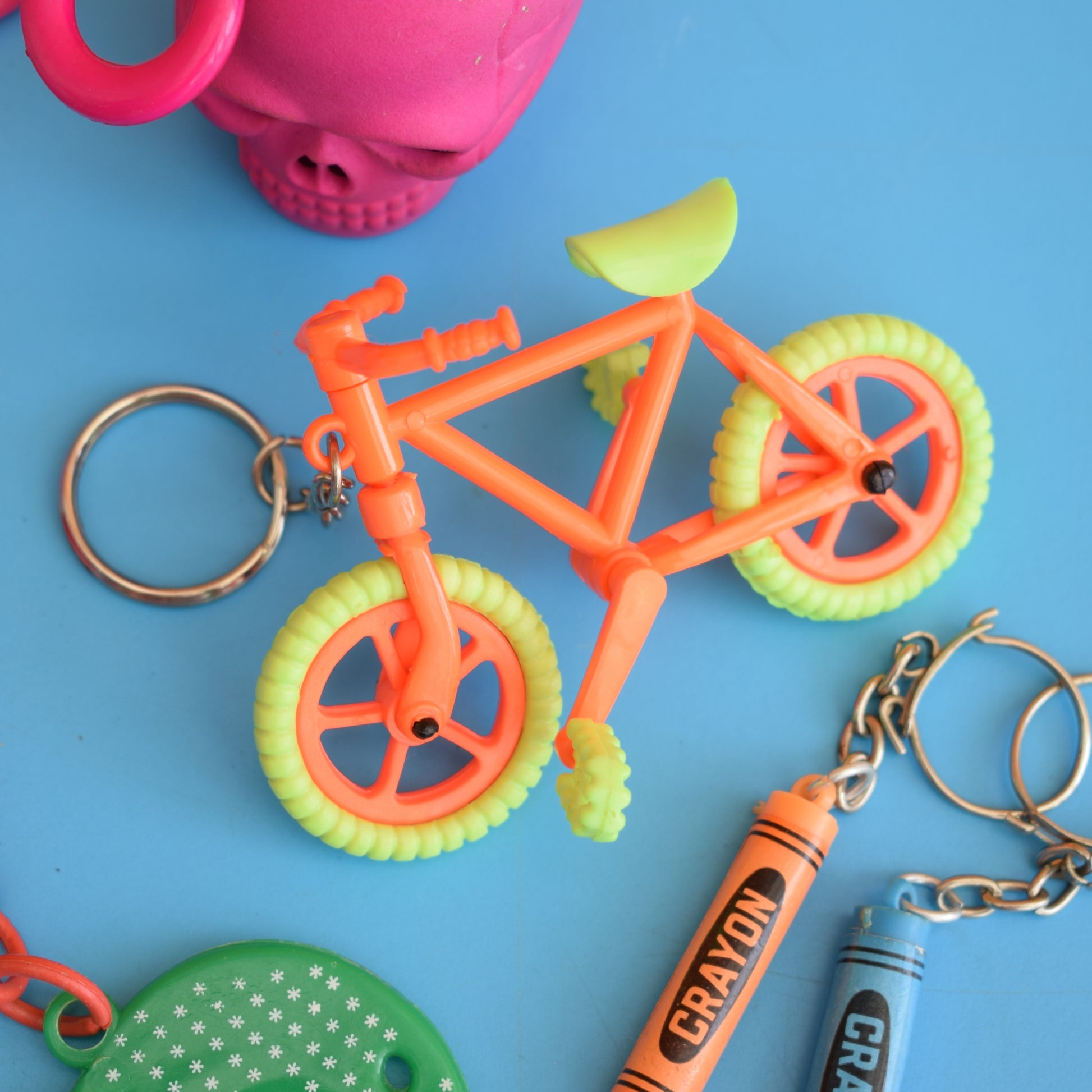 Vintage 1980s Mixed Keyrings - PacMan, Miniatures Etc by Pineapple Retro