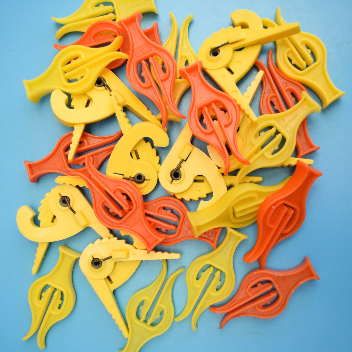 Vintage 1970s Plastic Clothes Pegs - Orange & Yellow by Vintage