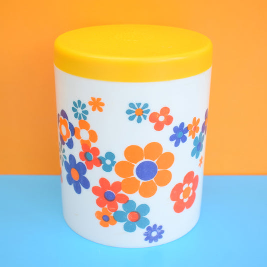 Vintage 1970s Flower Power Plastic Canister - Orange, Yellow & Blue