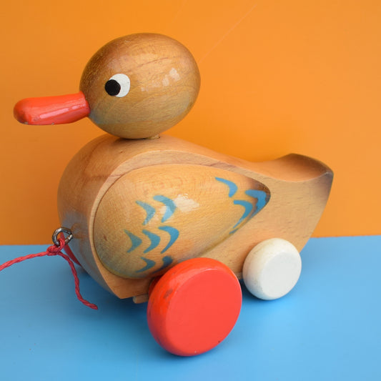 Vintage 1960s Wooden Pull Along duck With Wheels .