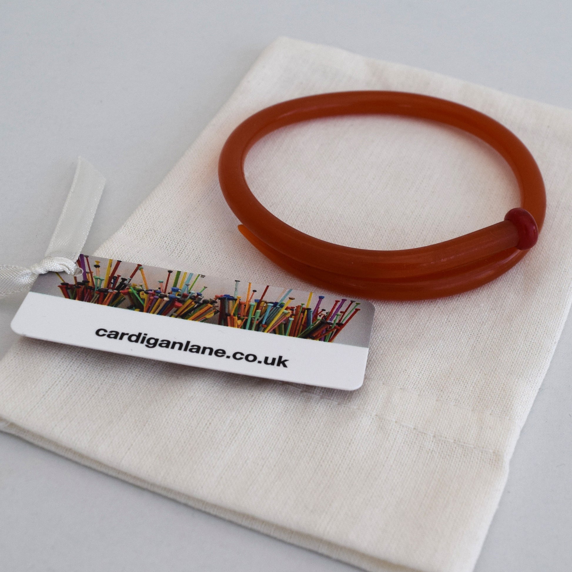 Retro Bangle by Cardigan Lane - Knitting Needle, Dark Orange With Gift Bag